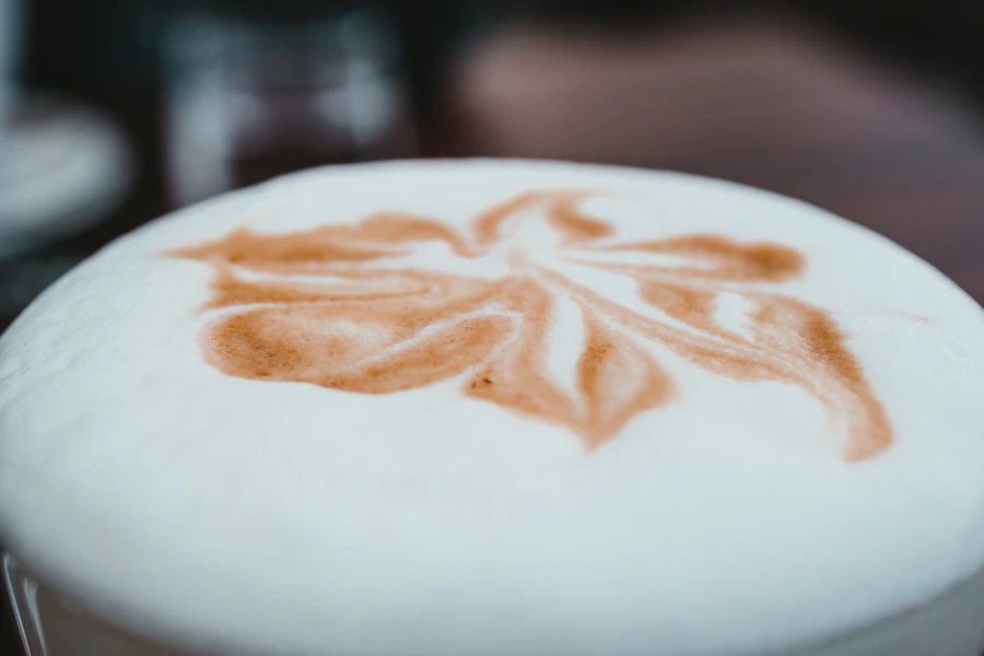 Close-up of a cappuccino with latte art