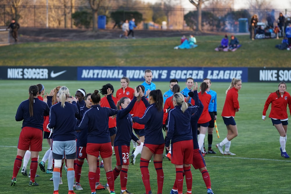 group of women football player on field