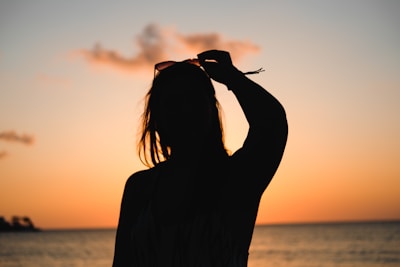 silhouette of woman at beacnh