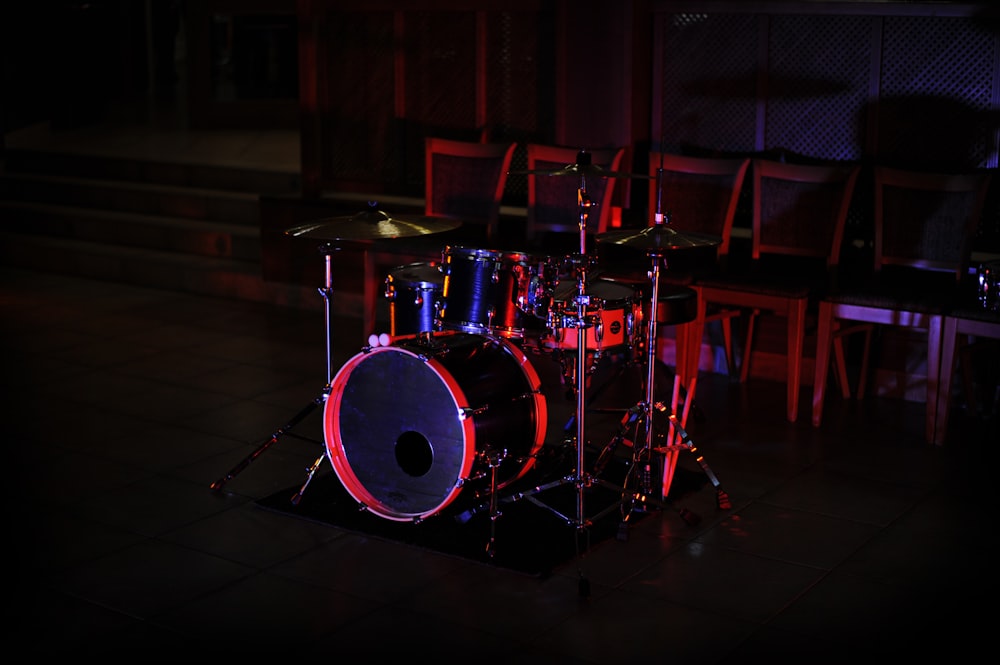 black and gray drum set on stage