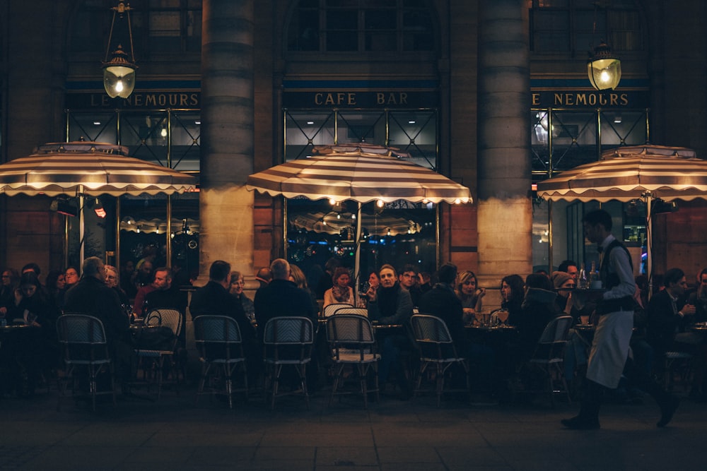 people underneath parasols