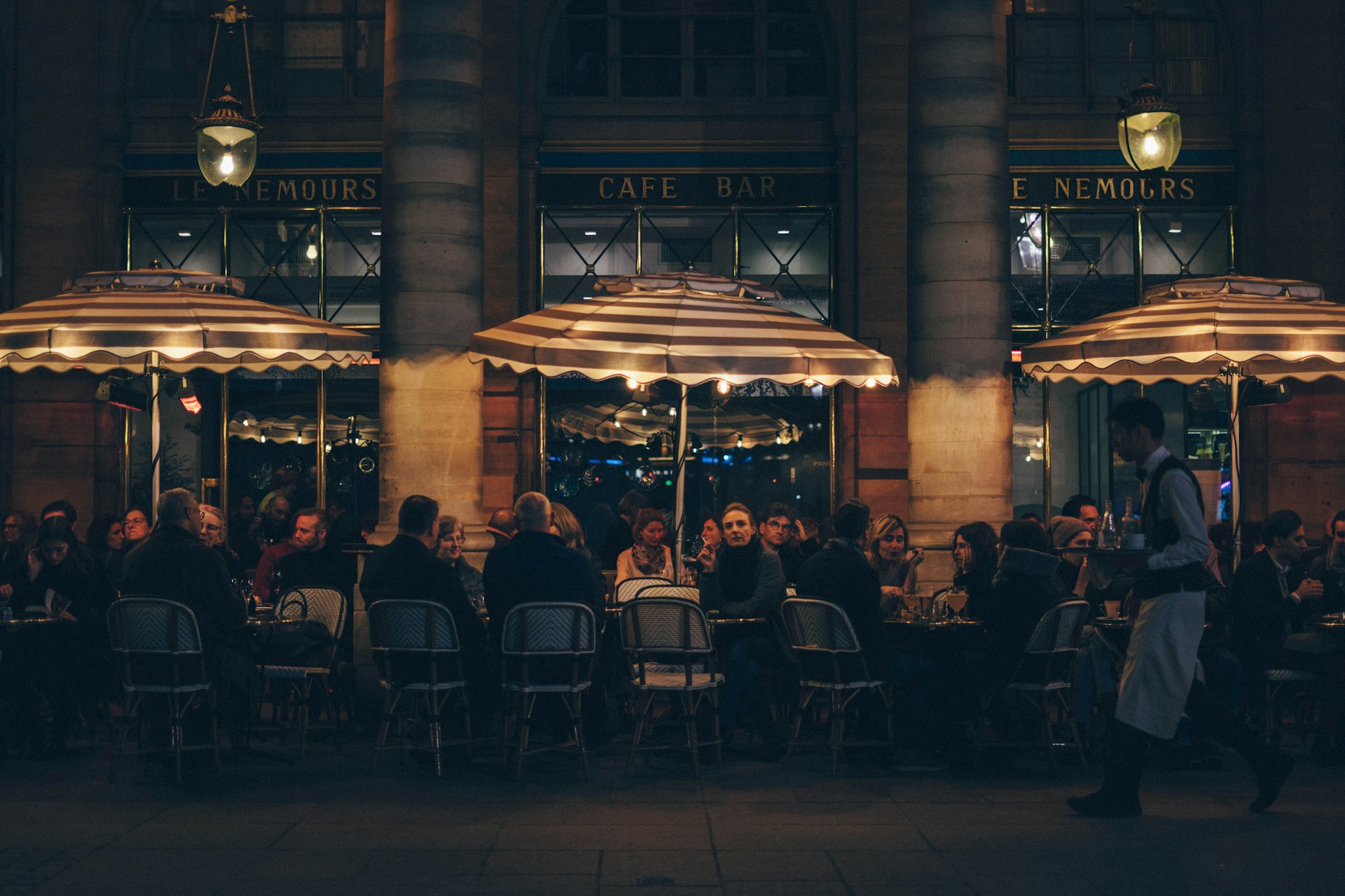 people underneath parasols