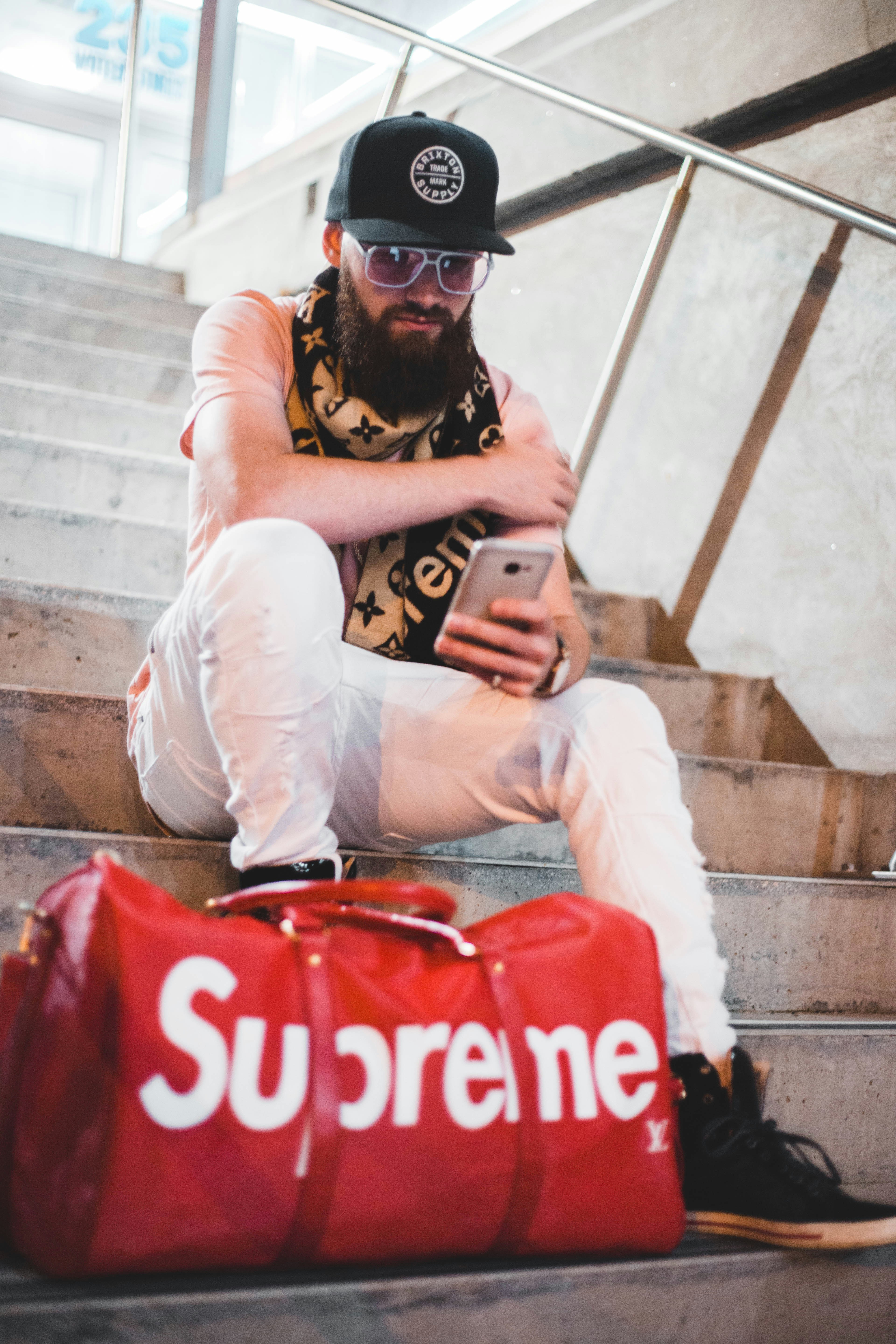 red supreme man bag