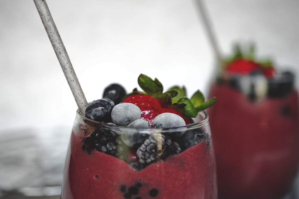 selective focus photography of glass of strawberry drink