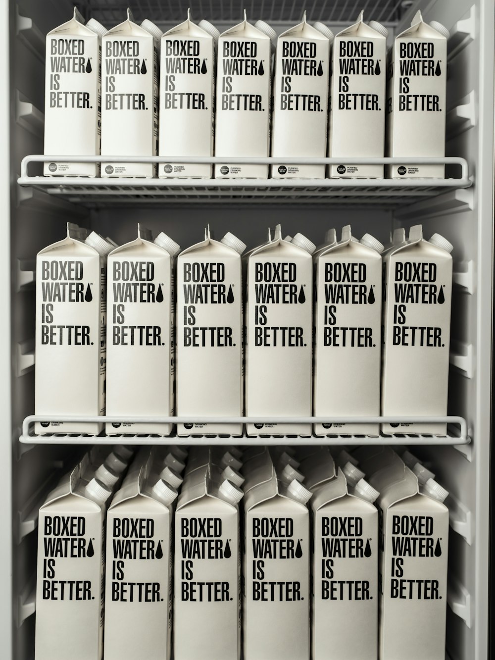 A water refrigerator full of Boxed Water cartons