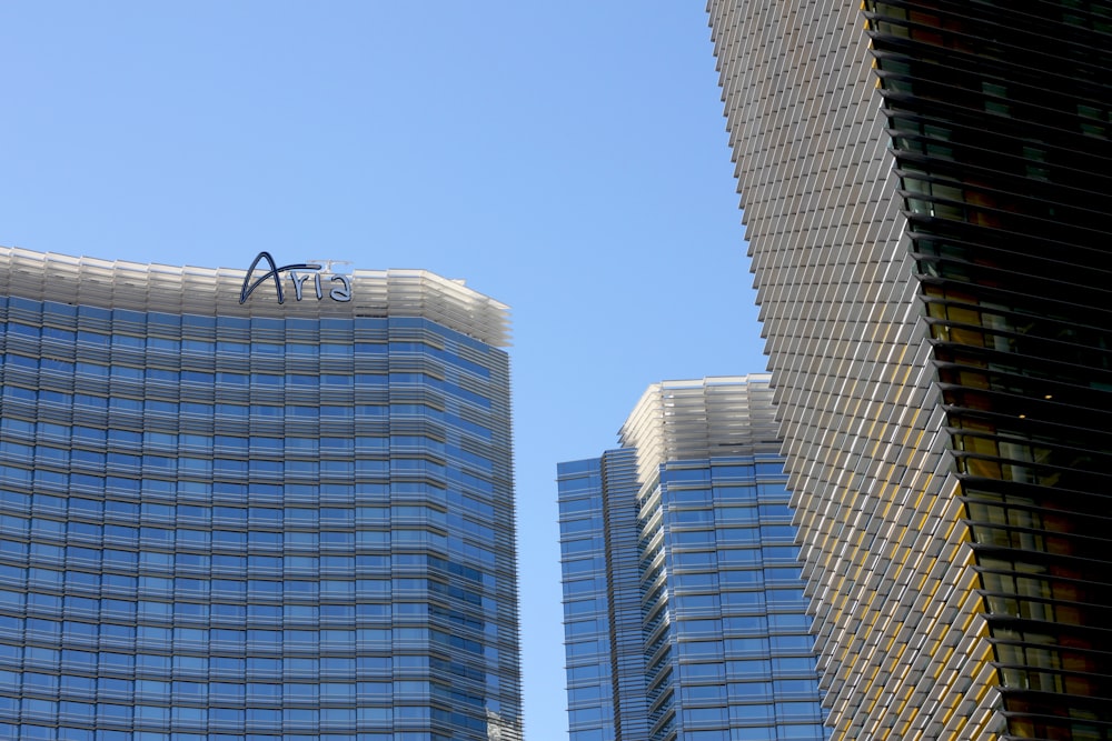 low angle photography of glass curtain buildings during daytime