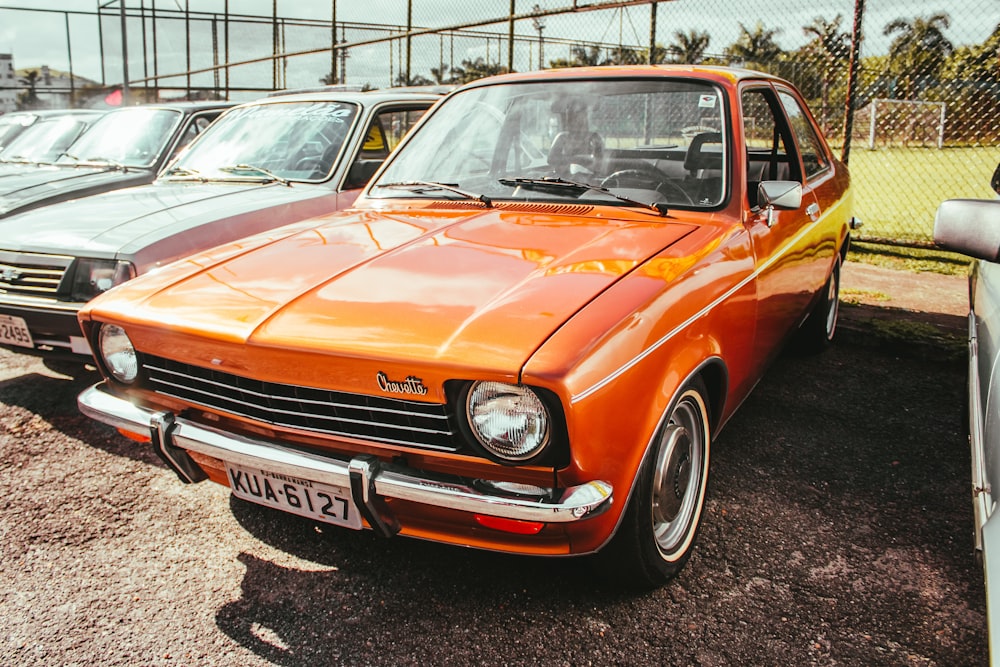 orange car on parking lot