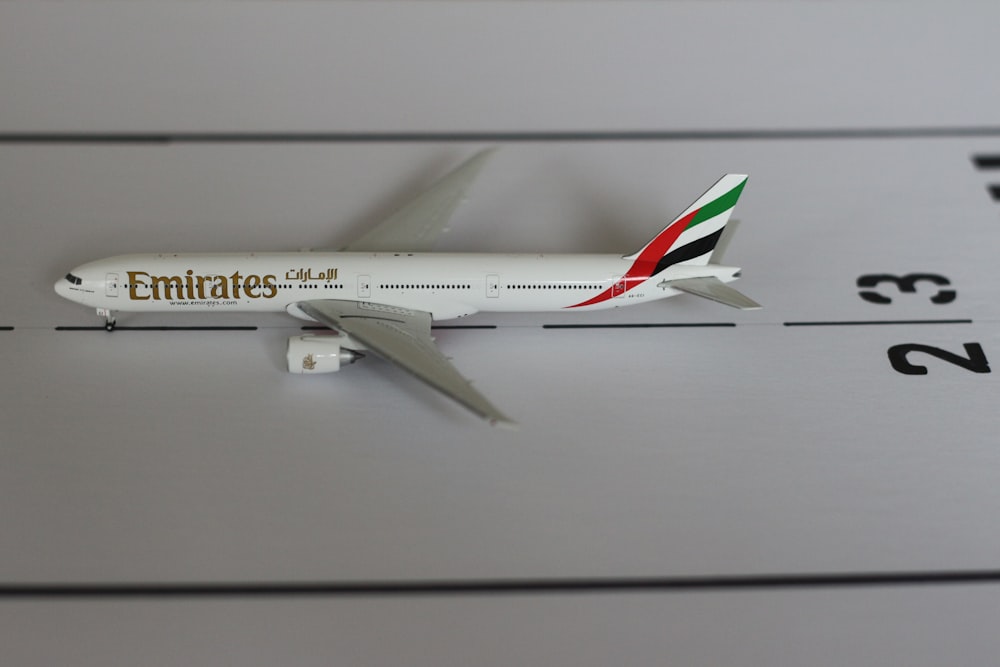 white Fly Emirates plane scale model