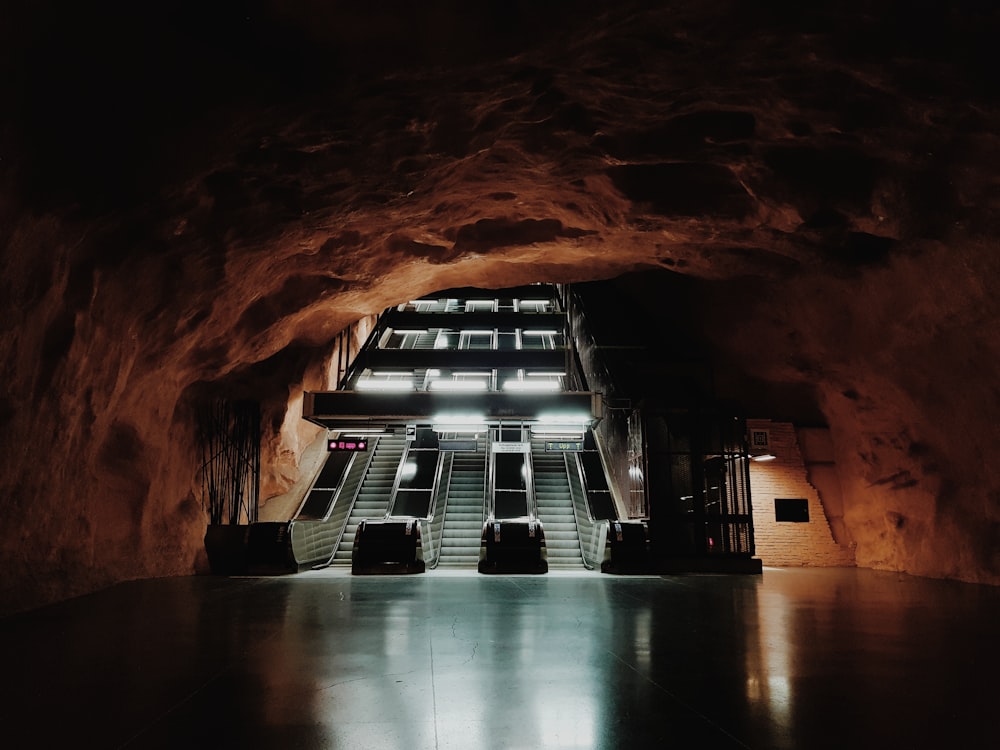 an underground subway station with stairs leading up to it