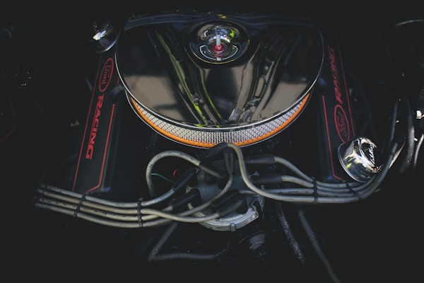 A close-up of a car's cabin filter being installed.