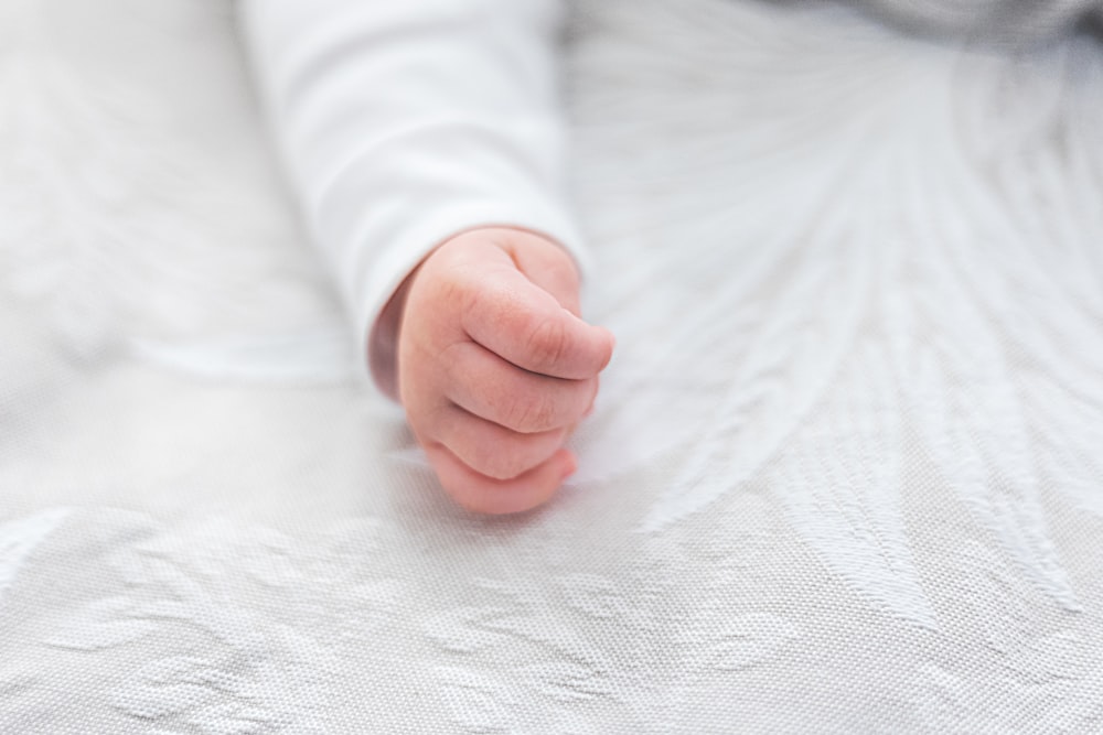 Premium Photo  The small hand of a newborn baby