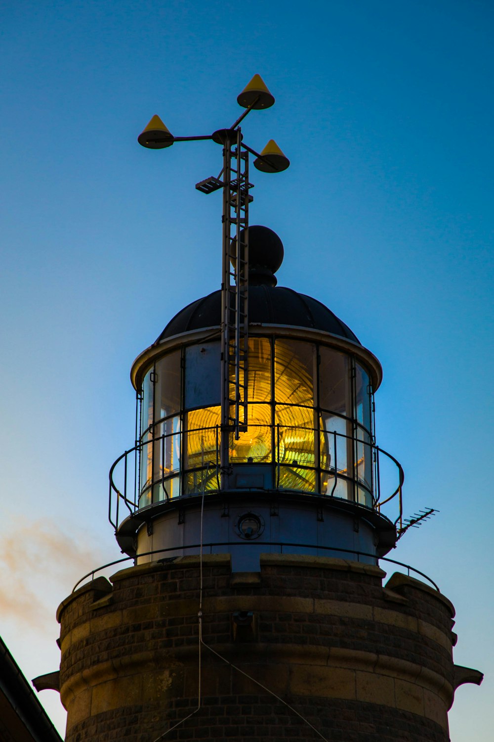 white lighthouse at dusk