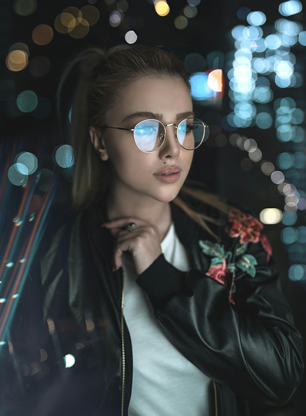 woman in black leather jacket