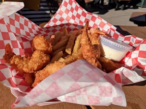 fried shrimp on white and red tray