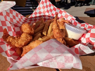 fried shrimp on white and red tray