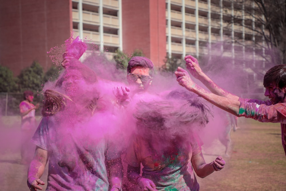people in color spray festival