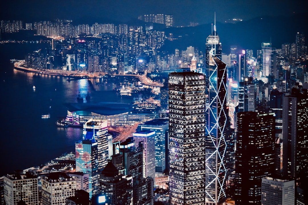 lighted city skyline at night,