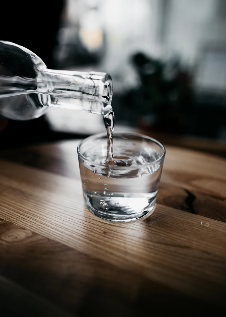 Clean treated drinking water being poured into a glass in an Idaho kitchen