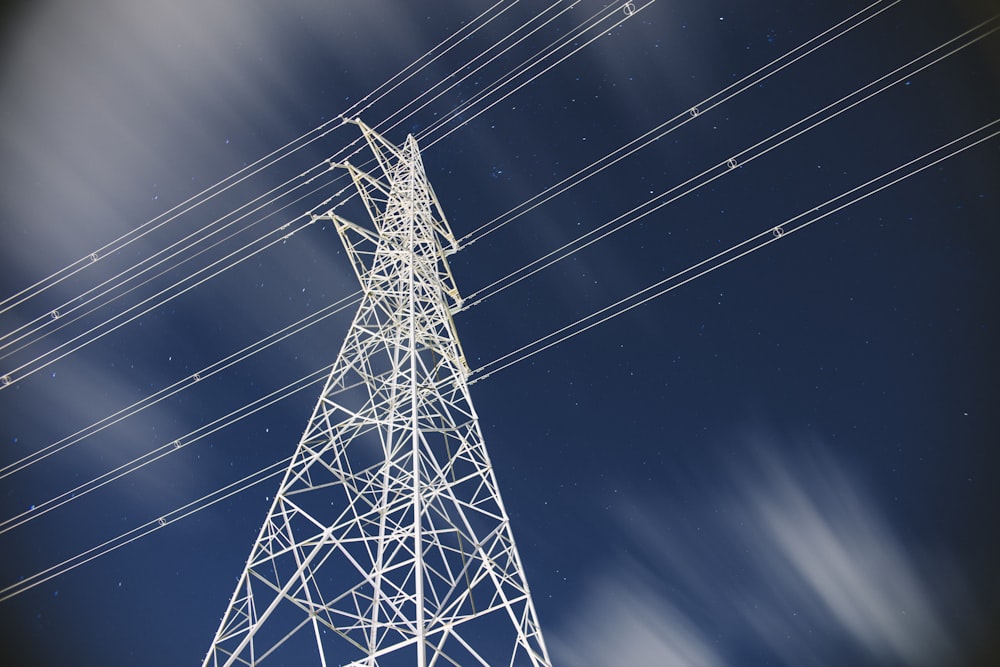 low-angle photography of transmission tower