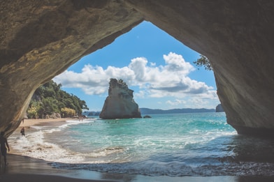 ocean sea waves on seashore in cathedral cove on our 16 day tour