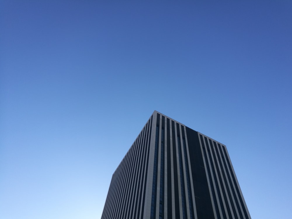 low angle photography of gray tower