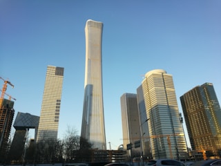 Image showing Dubai’s skyline with iconic skyscrapers under a clear sky.