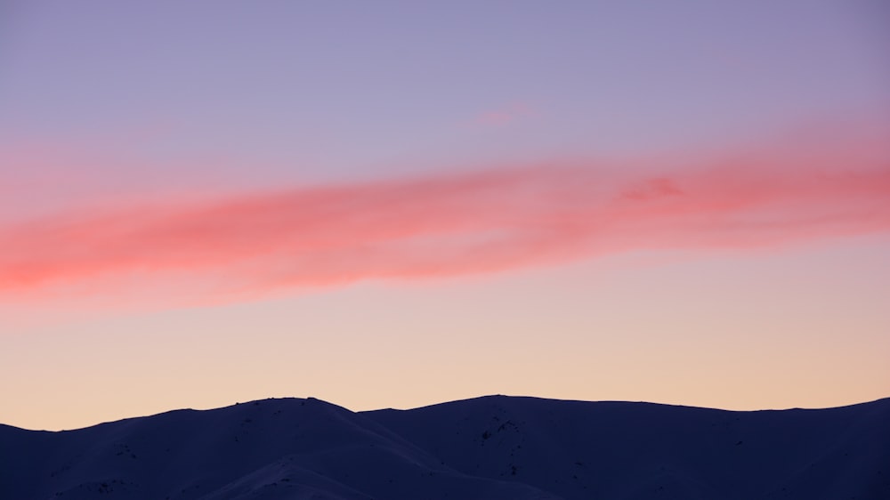 silhouette of mountain during golden hour