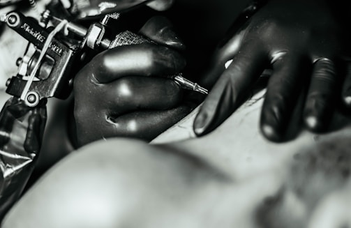 Close-up of a tattoo consent form being signed electronically.