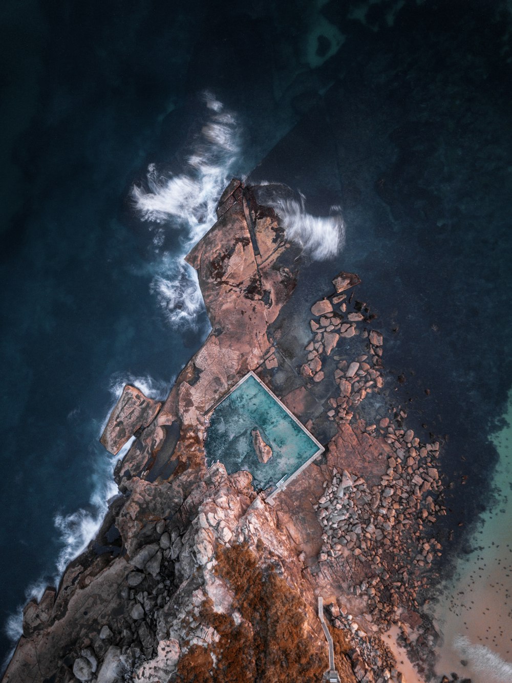 mountain and ocean waves aerial scenery