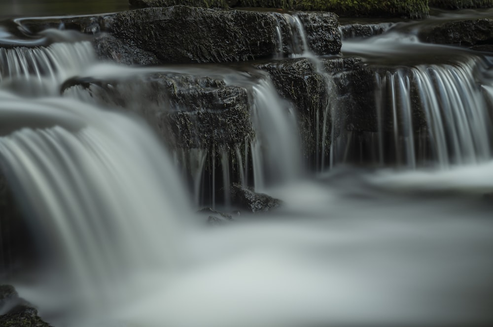 time-lapse photograph of waterfalls