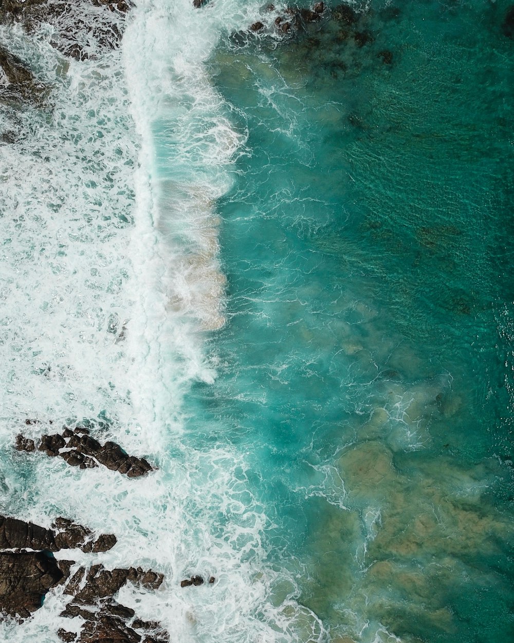 waves crushing on rocks