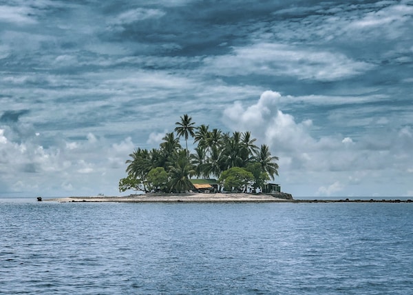 photography of island against sky