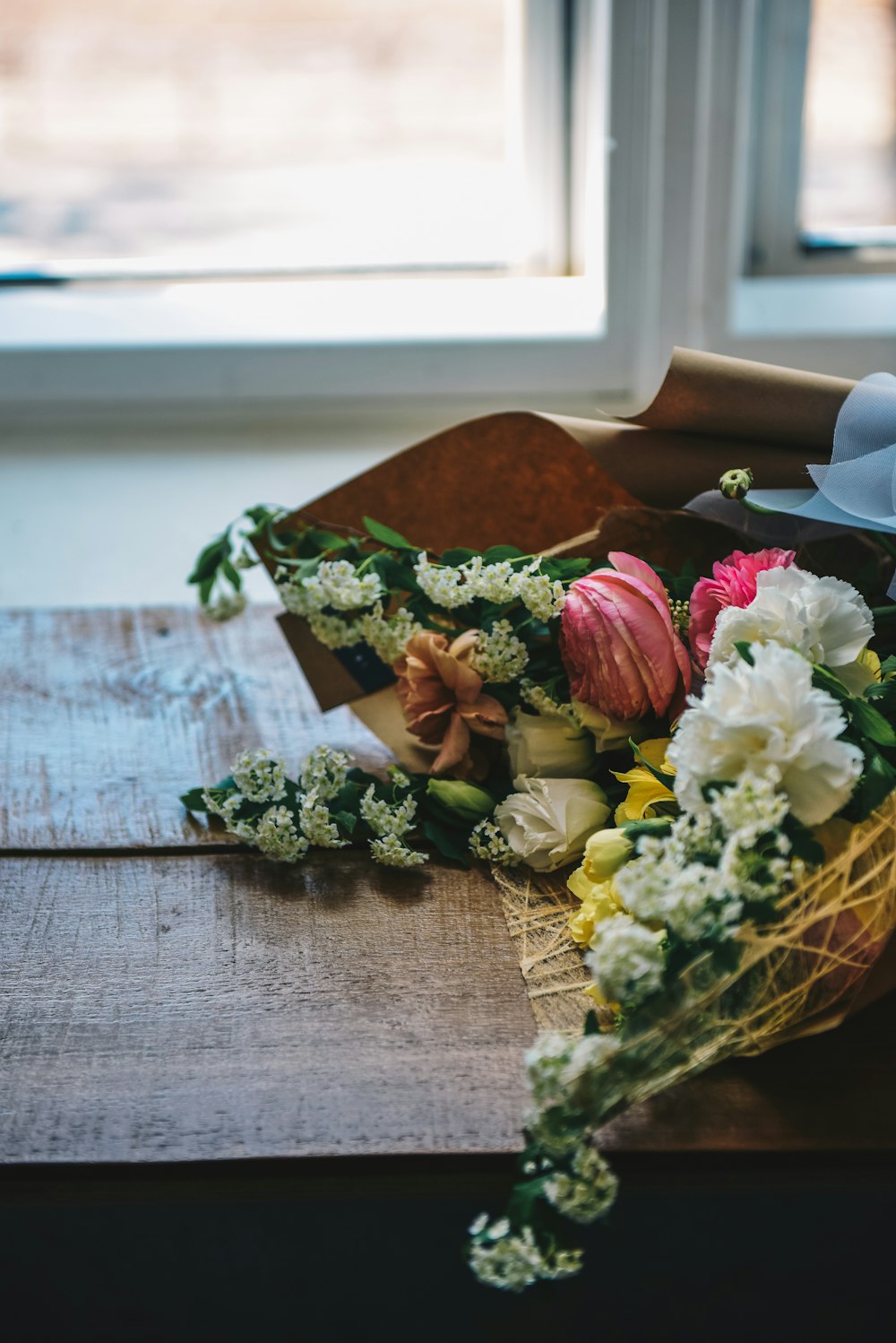 white and pink flower bouquet