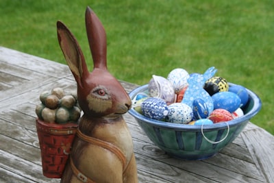 brown rabbit figurine easter bunny teams background