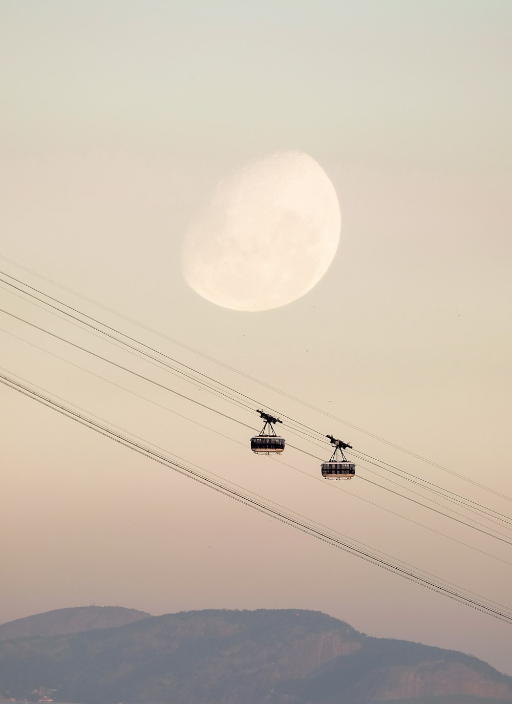two black cable cars