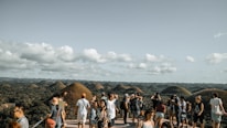A group of diverse travelers enjoying a scenic destination together.