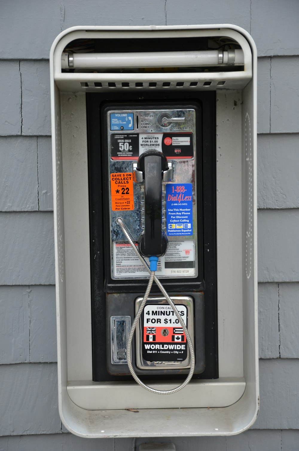 black and gray payphone