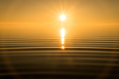 balance and symmetry for photo composition,how to photograph sun setting over the great salt lake; sunset