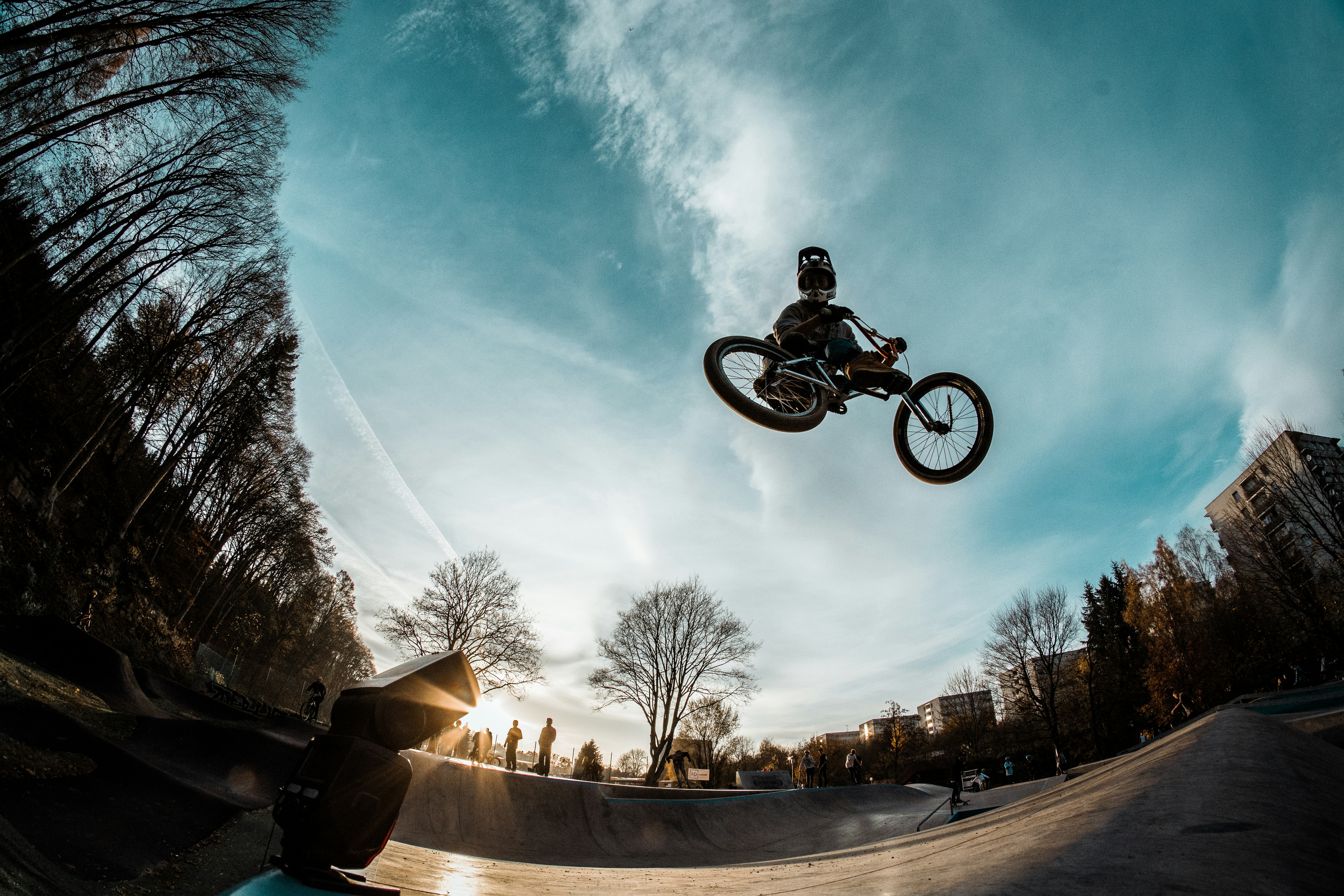 low-angle photography of person riding on motorcycle