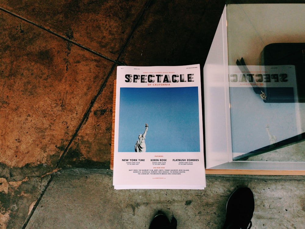 Spectacle book on brown surface
