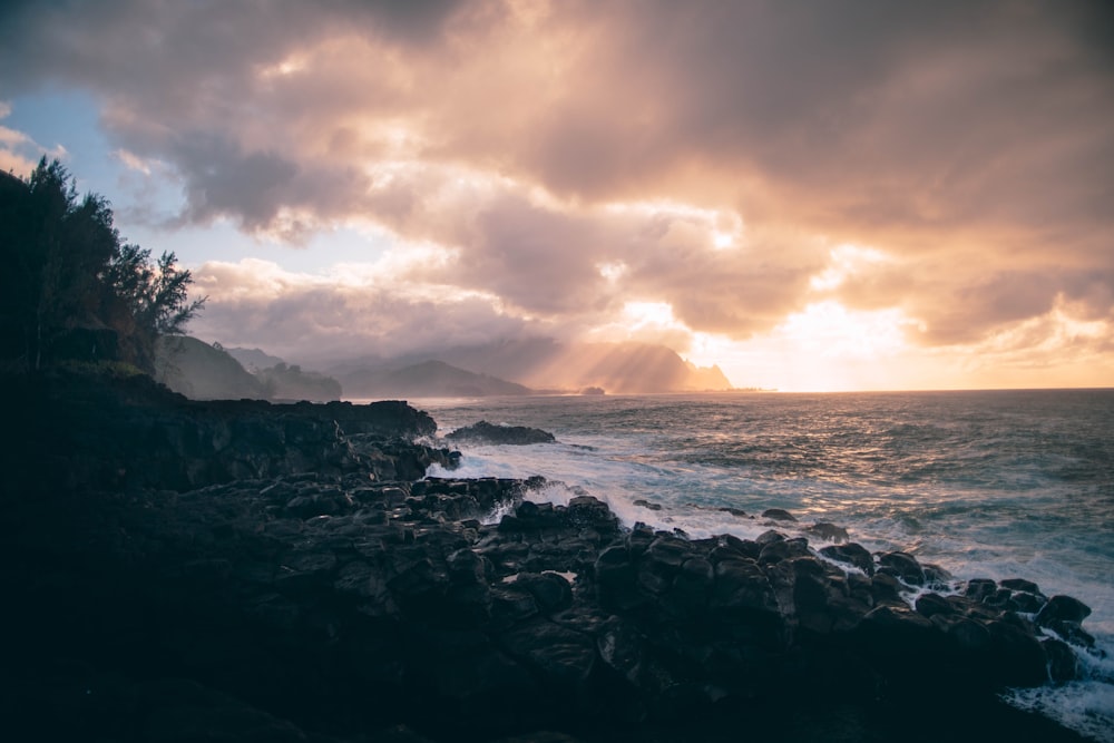 landscape photography of black rock formation