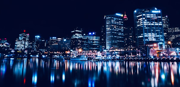 A vibrant photograph showcasing a bustling cityscape with sharp contrasts and elegant lighting.