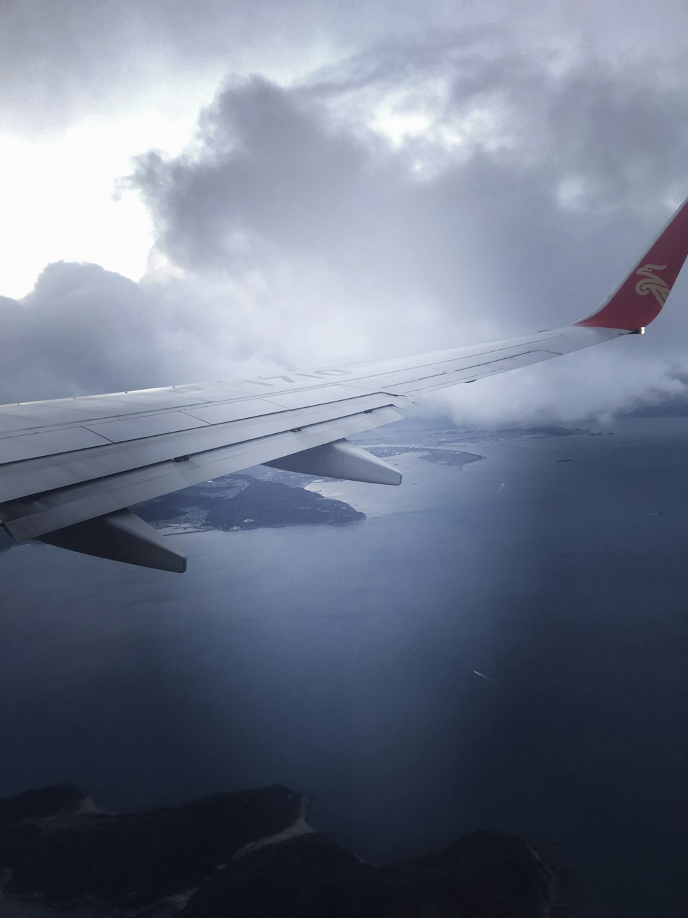 white and red aircraft wing