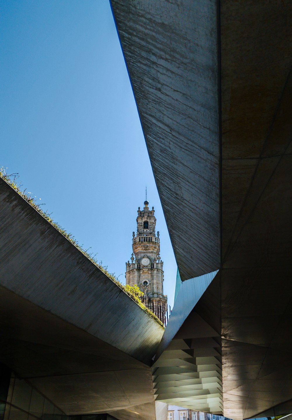 gray concrete tower during daytme