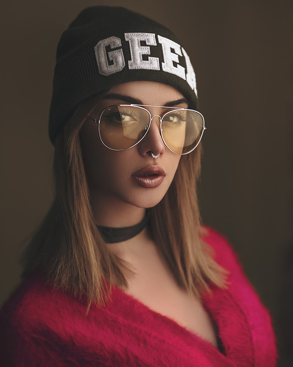 woman wearing black and white knit hat