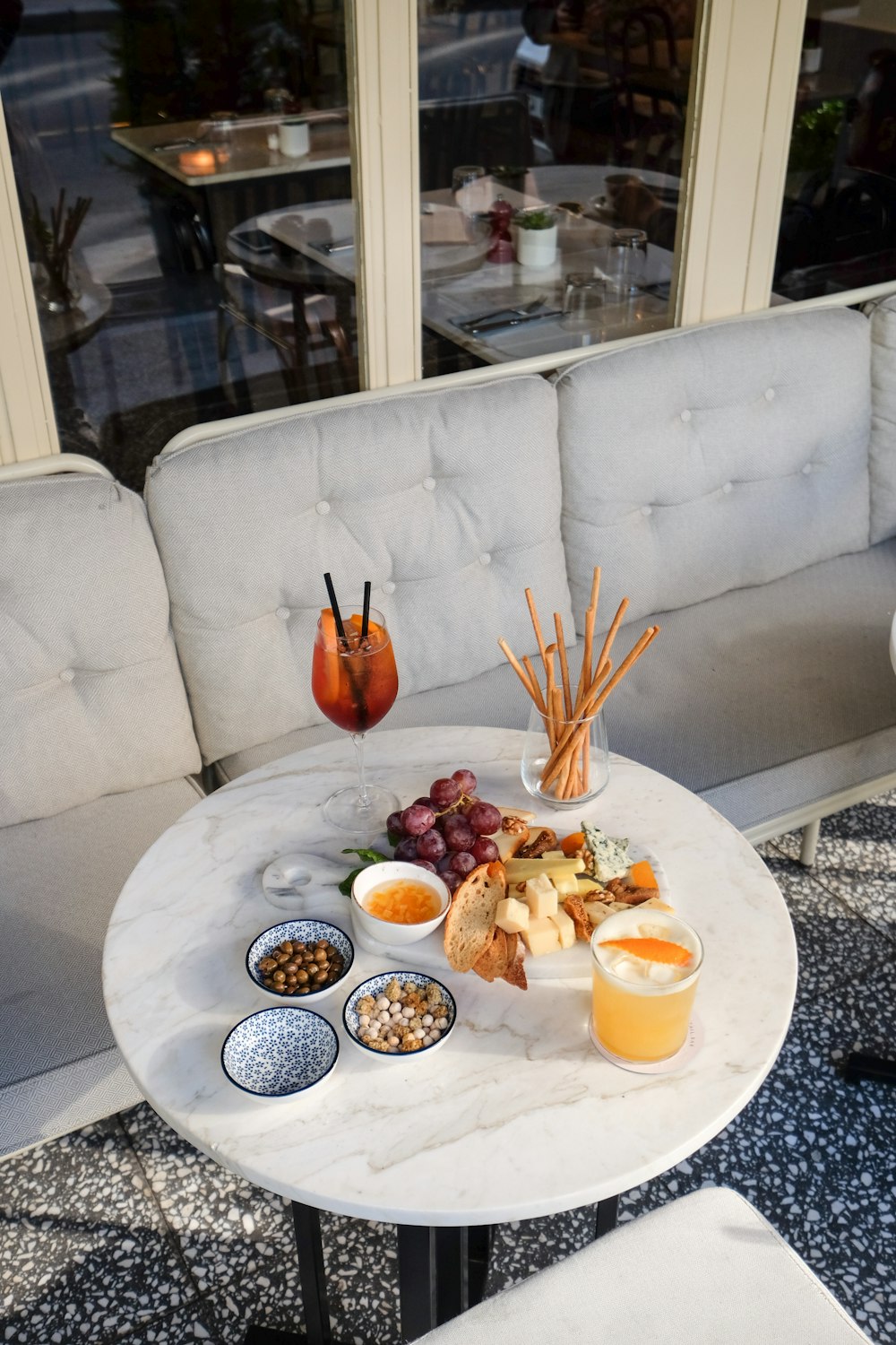 sliced orange fruit on white ceramic bowl