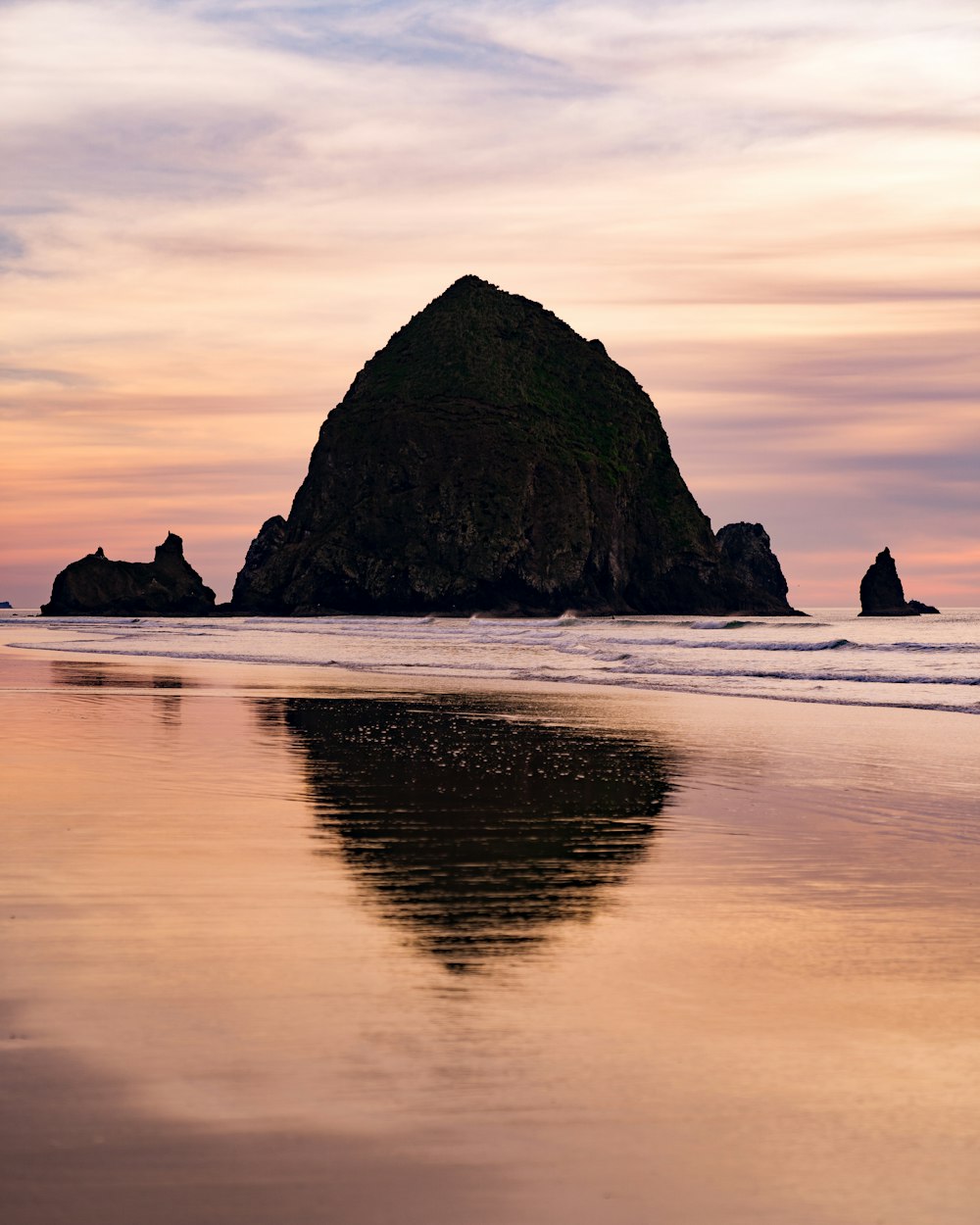 rock in the middle of sea