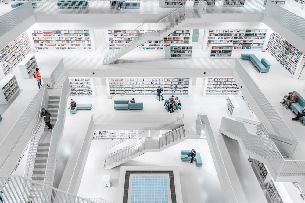 photo of white concrete building interior