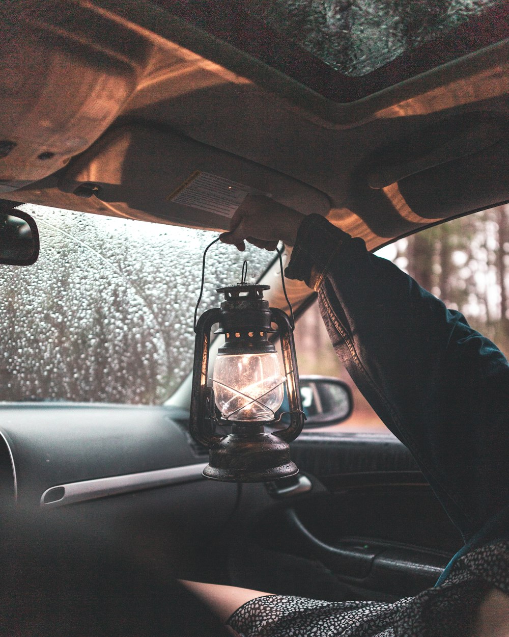 person holding lamp