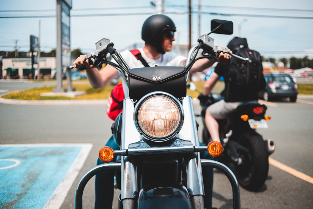 man riding on motorcycle